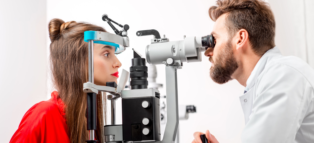 Optometrist performing a slit-lamp exam